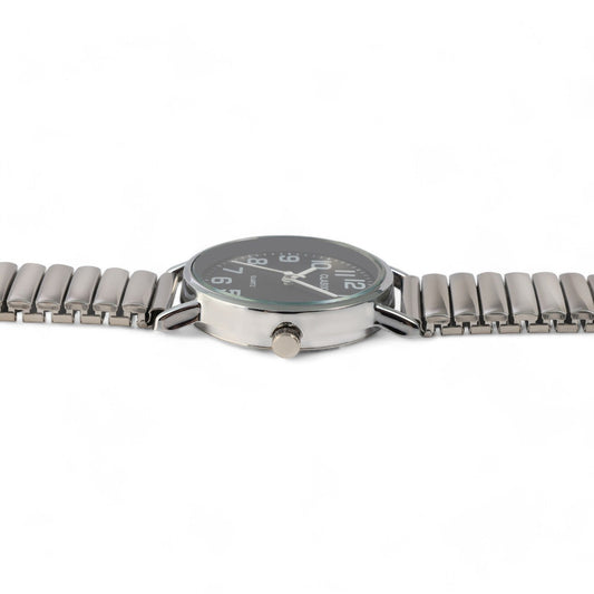 Elegante Damenarmbanduhr mit silbernem Metallarmband, schwarzem Zifferblatt und runder Lünette, seitlich fotografiert