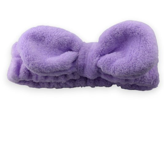 Flauschiges lila Stirnband aus Molton-Stoff mit Schleifendesign für Make-up und Haarpflege