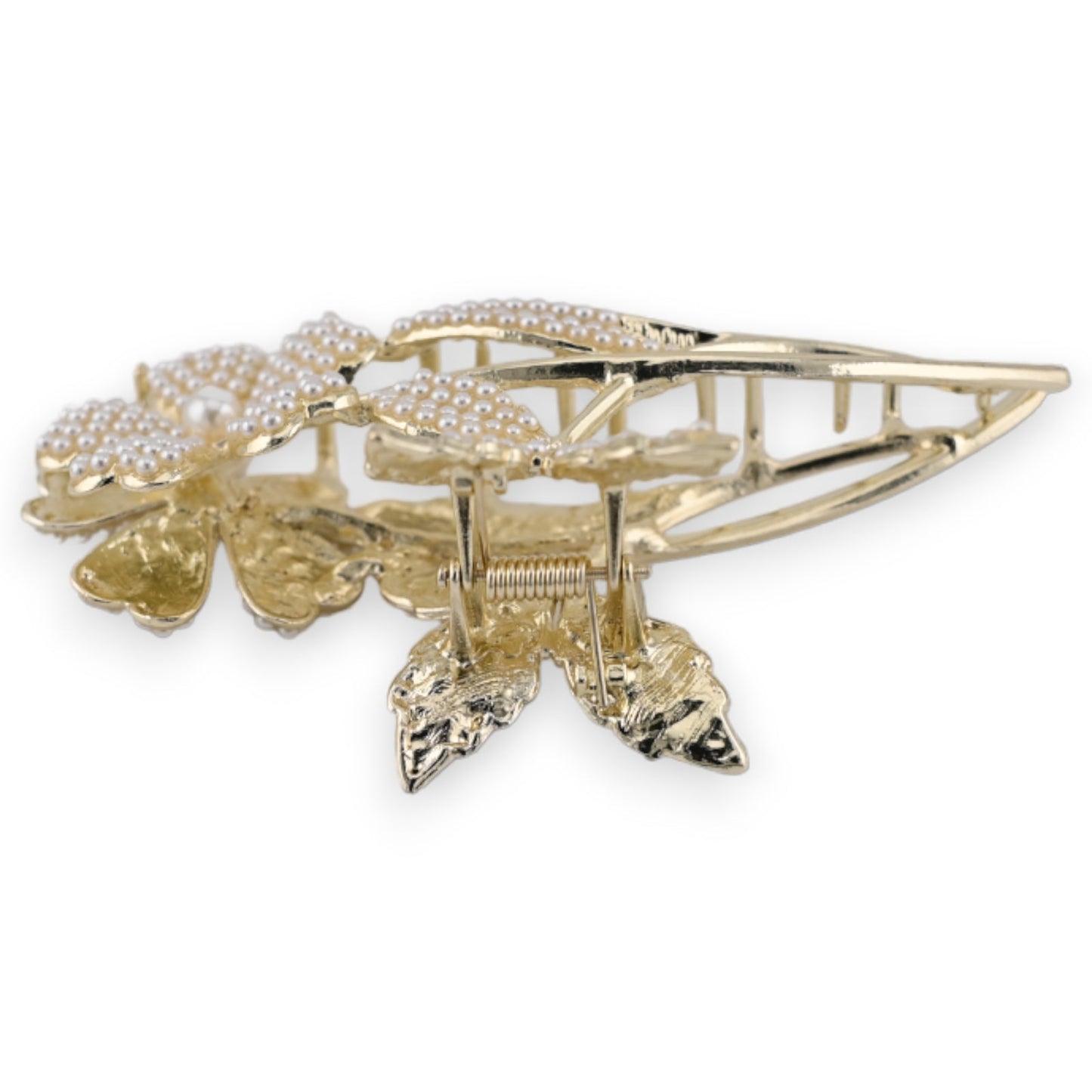 Elegante goldene Haarspange mit Blumenmotiv, besetzt mit Perlen, dekorative Blütenform und filigrane Details