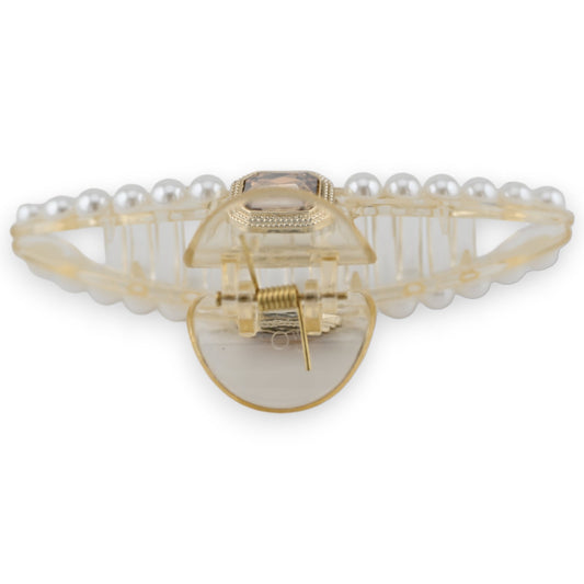 Elegante Haarspange mit goldenen Elementen, braunem Edelstein und Perlenreihe, detaillierte Verzierung und Verschluss