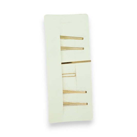 Set aus 5 goldenen Haarspangen auf hellgrünem Hintergrund, minimalistisches Design für eleganten Haarschmuck