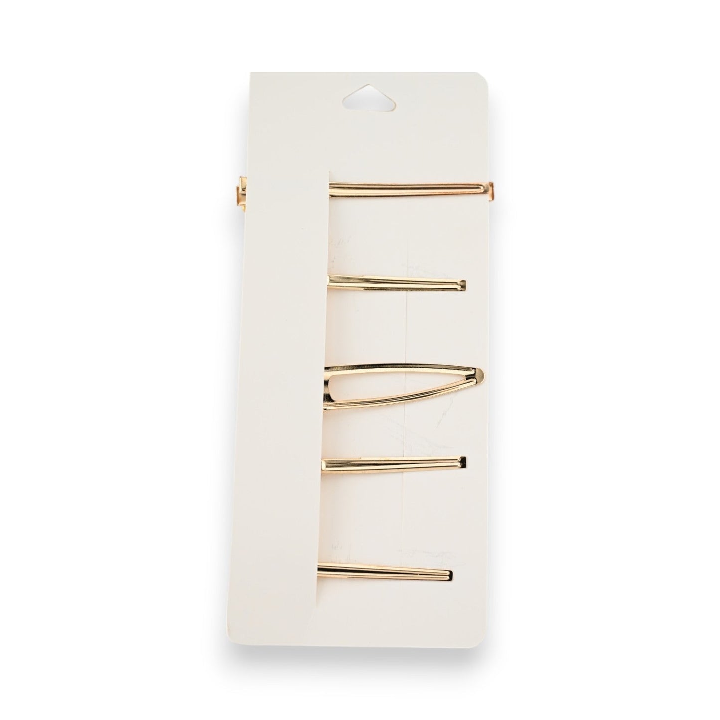 Set aus fünf goldenen Haarspangen auf weißer Karte, minimalistisches Design, elegante Haaraccessoires