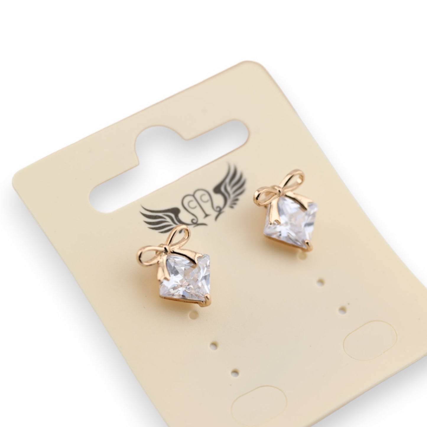 Goldene Ohrringe, fantasievoll, glänzender Stein, Schleife