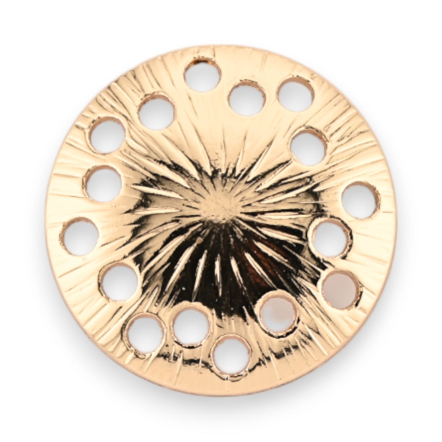 Goldene runde Magnetbrosche mit strahlenförmigem Muster und Löchern am Rand für verschiedene Steine