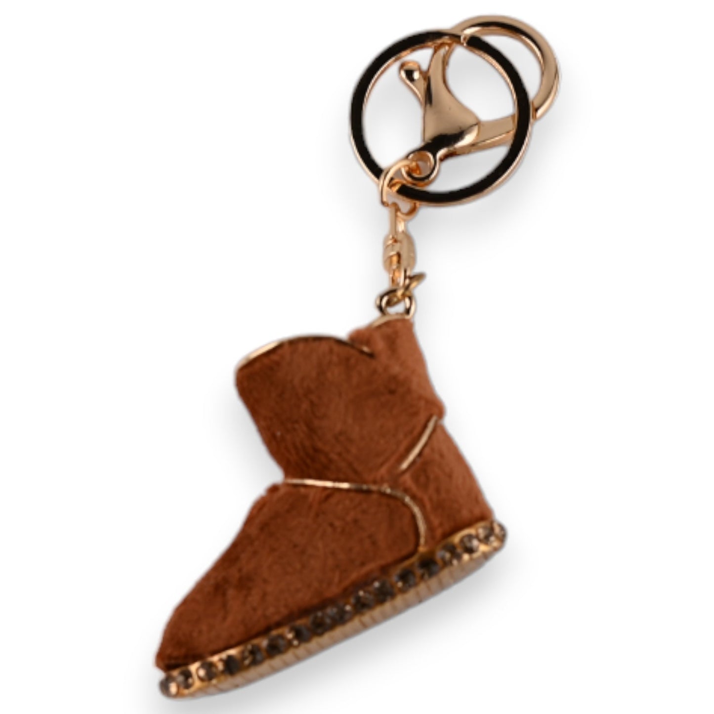 Goldener Schlüsselanhänger mit braunem Miniatur-Kamelhaarschuh, verziert mit glitzernden Steinen am Rand
