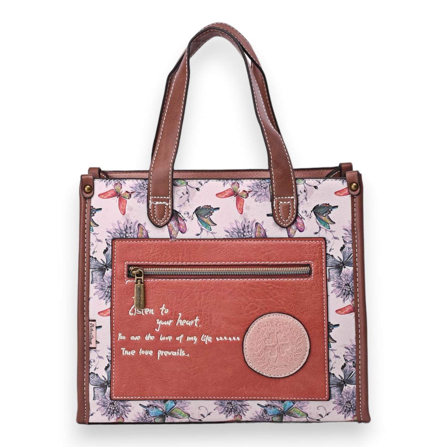 Handtasche mit floralem Muster, braunem Leder und Schriftzug 'Listen to your heart'. Reißverschluss und dekorative Münze.