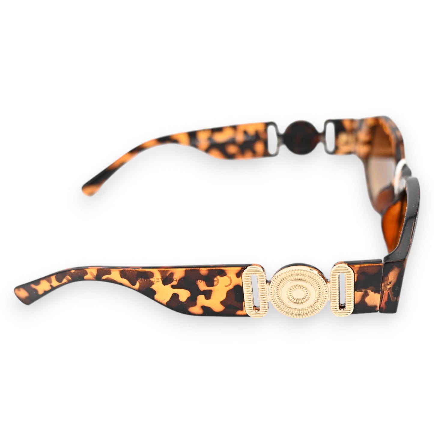 Rechteckige Sonnenbrille mit Leopard-Muster, braunen Bügeln und goldenen Schmuckstücken, modisches Accessoire