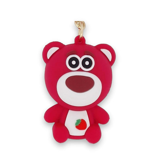 Roter Bärenschlüsselanhänger aus Kunststoff mit großen Augen, weißem Gesicht und Erdbeer-Symbol auf dem Bauch, niedliches ...