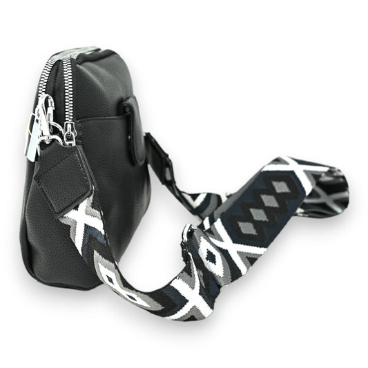 Kompakte schwarze Umhängetasche mit Reißverschluss und abnehmbarem Schulterriemen mit geometrischem Muster in Schwarz-Weiß