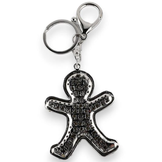 Silberner Schlüsselanhänger mit glitzerndem Keksmann-Anhänger, besetzt mit kleinen Kristallen, an einem Karabinerhaken