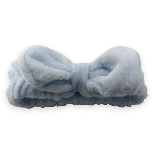 Gepolstertes Kosmetik-Stirnband in Himmelblau, weiches Beauty-Accessoire mit dekorativer Schleife