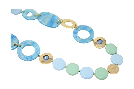 Vintage Halskette mit blauen und goldenen Elementen, runden Formen und Kreisen aus Stein und Metall in Pastelltönen