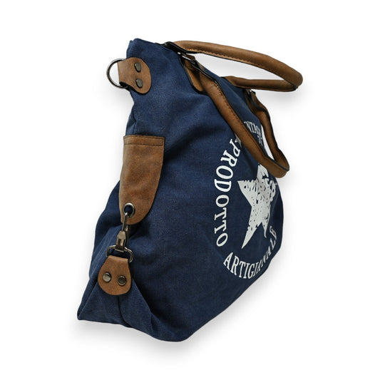 Vintage Handtasche aus blauem Jeansstoff mit Stern-Logo, braunen Lederdetails und Aufschrift 'Prodotto Artigianale'