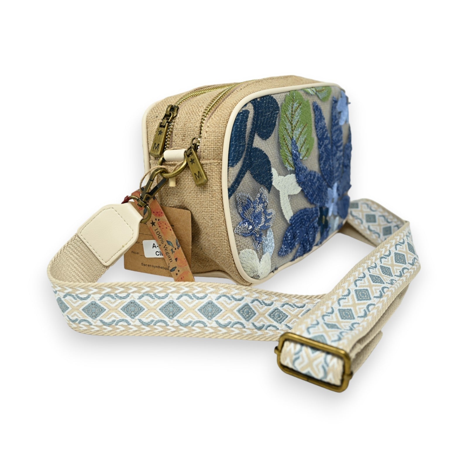 Beige Schultertasche mit blauen Blumenstickereien, Reißverschluss und gemustertem Trageriemen, kleine Größe