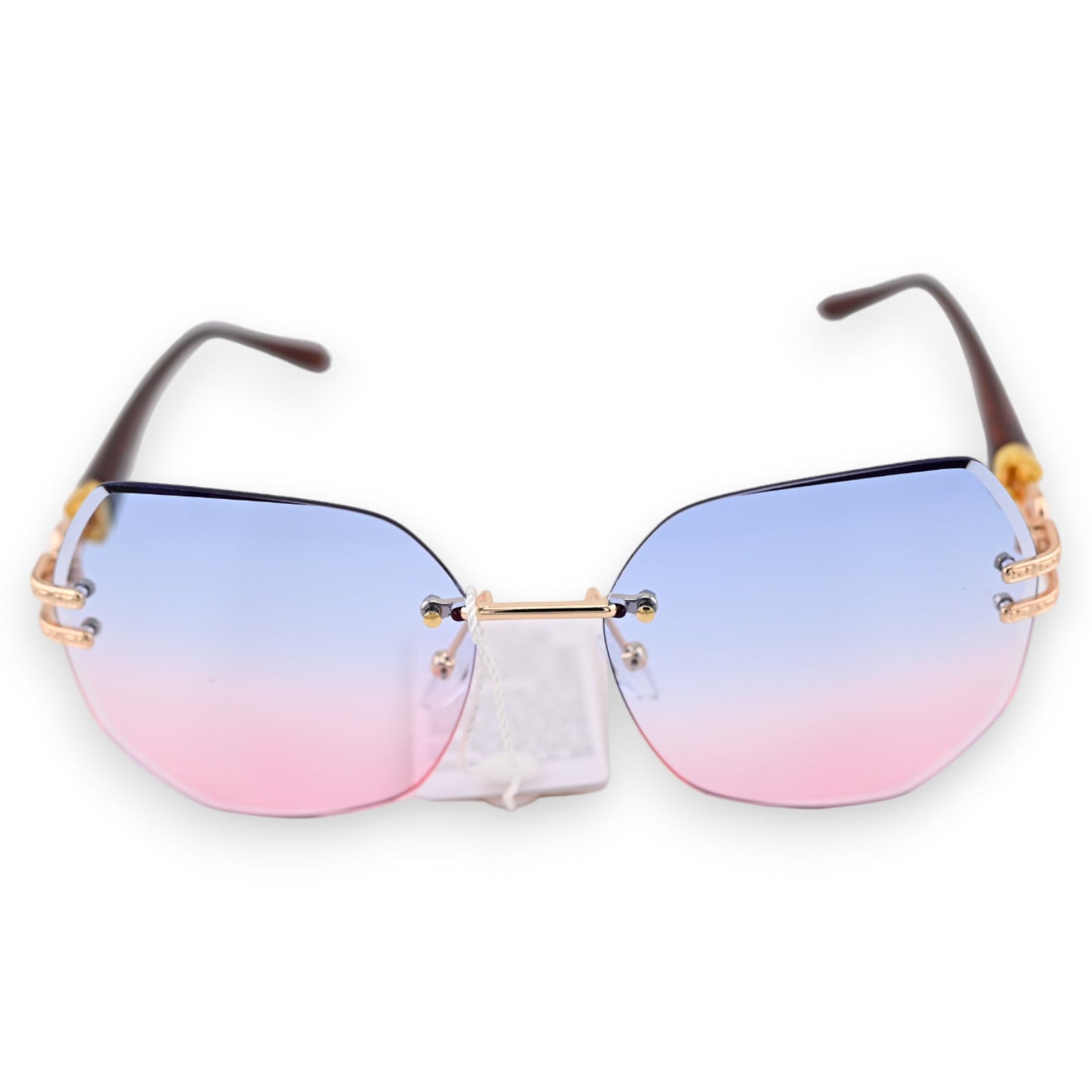 Moderne Sonnenbrille mit rahmenlosem Design und blau-rosa Farbverlauf in den Gläsern, goldene Akzente