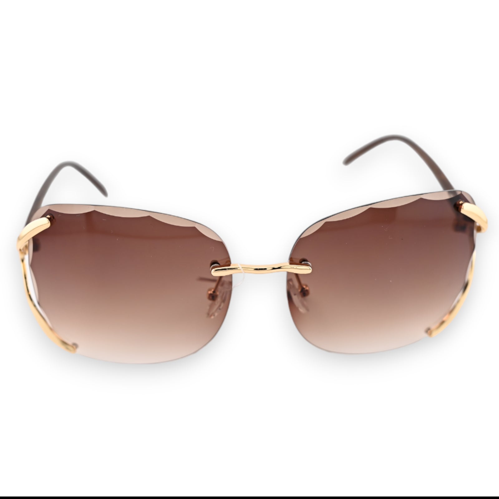 Elegante Sonnenbrille mit rahmenlosem Design, goldenen Bügeln und braun getönten Gläsern auf weißem Hintergrund