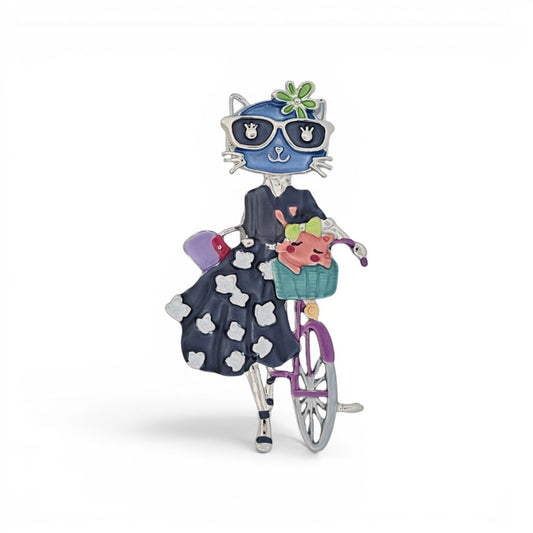 Magnetische Katzen-Brosche, elegante Katze auf lila Fahrrad, buntes Design, 7 cm hoch