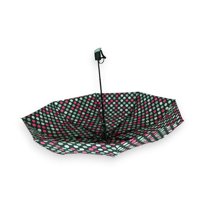 Halbautomatischer Falt-Regenschirm mit schwarz-weiß-pinkem Punktmuster, geöffnet auf weißem Hintergrund