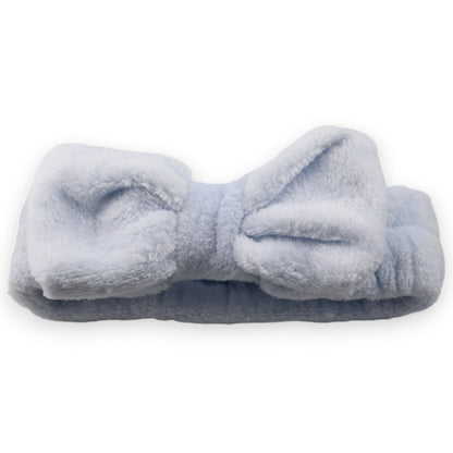 Flauschiges hellblaues Stirnband mit Schleife für Make-up und Gesichtspflege, weich und dehnbar