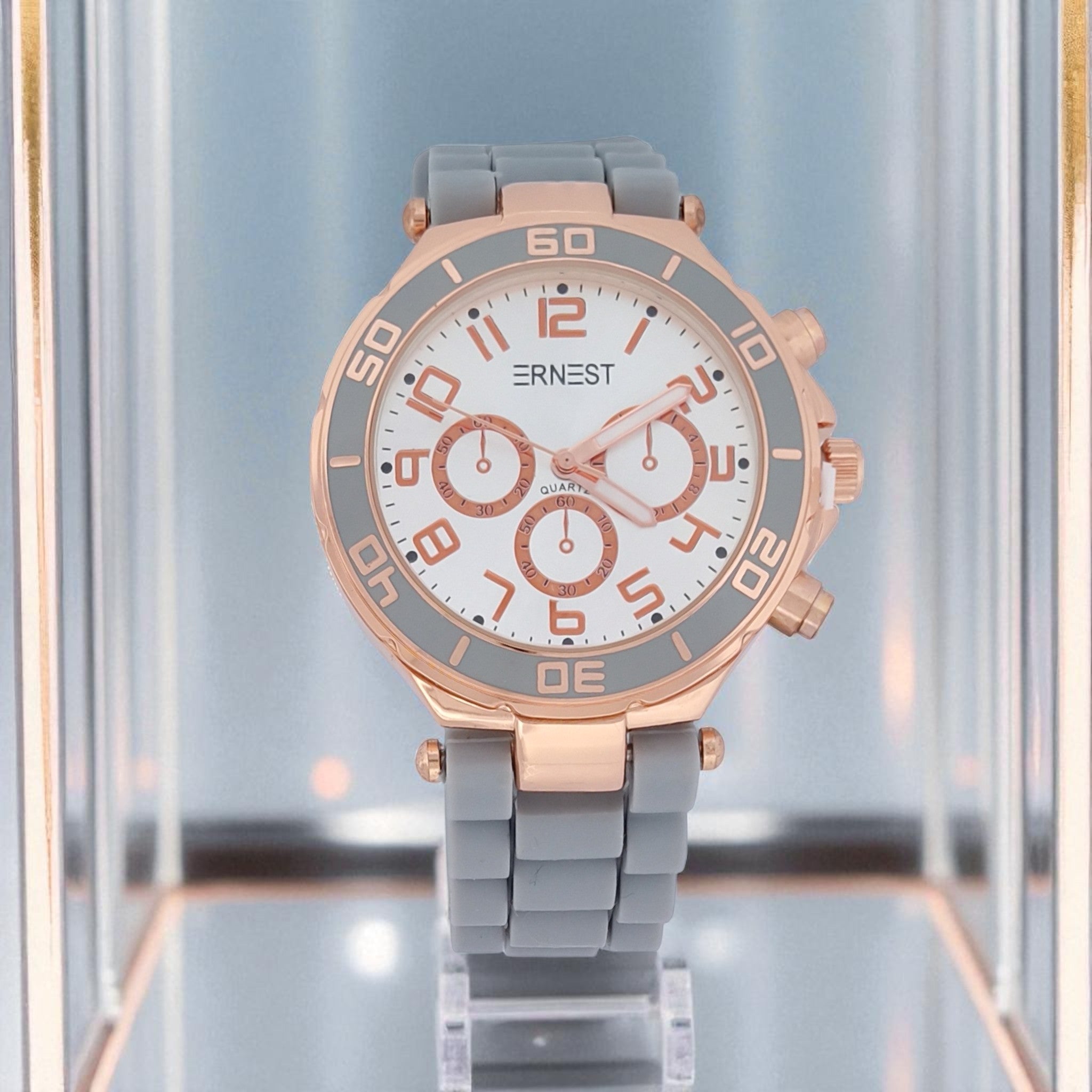 Vergoldetes Schmuckset mit grün-rosa Blumenmuster bestehend aus Kette und Ohrringen