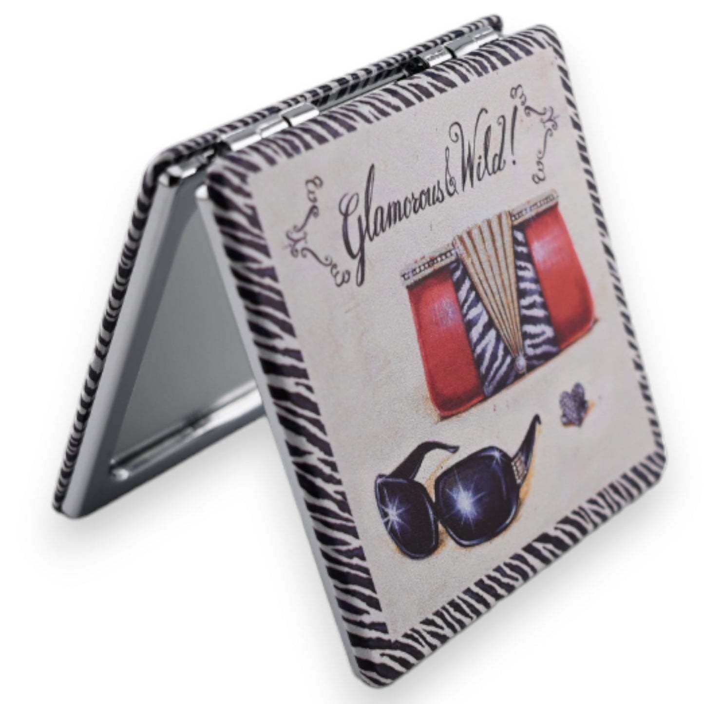 Glamouröser Klappspiegel mit Zebramuster, Aufschrift 'Glamorous & Wild!', Abbildungen von Lippenstift und Sonnenbrille