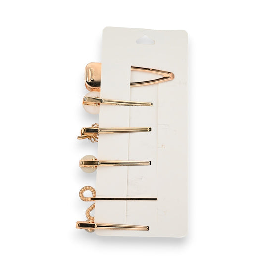 Set goldene Haarspangen: Zierliche Haarklammern und Haarnadeln mit Strassschere, elegant auf weißer Karte präsentiert
