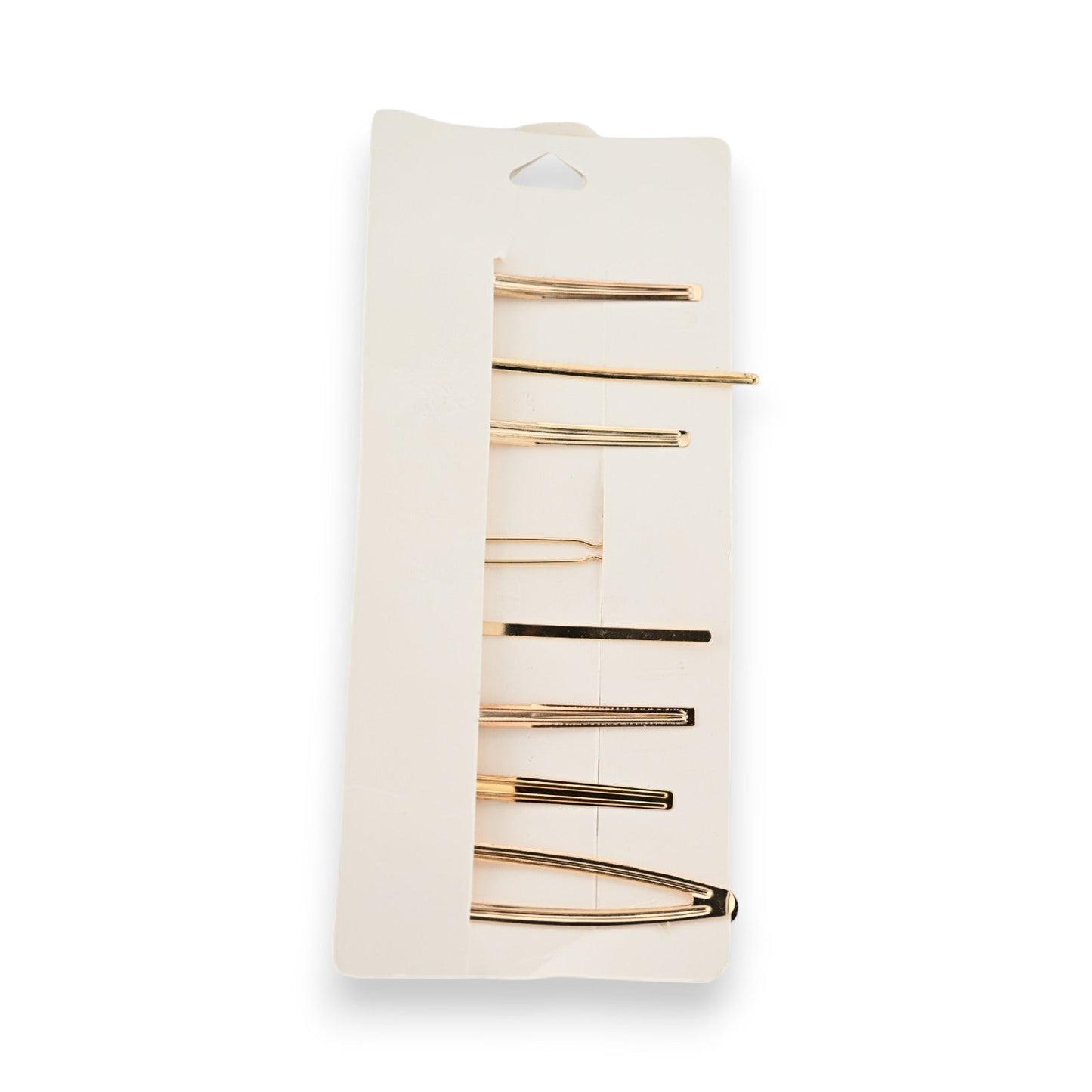 Set mit 8 goldenen Haarspangen auf weißer Karte, minimalistisches Design, verschiedene Längen und Formen für moderne Frisuren