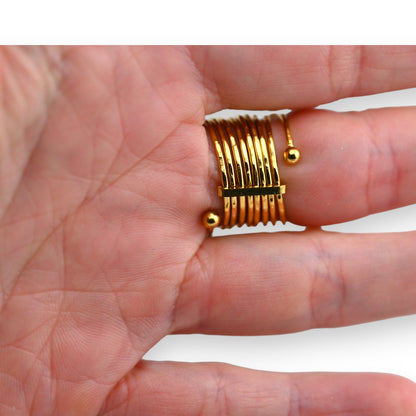 Bague acier dorée ressort strass