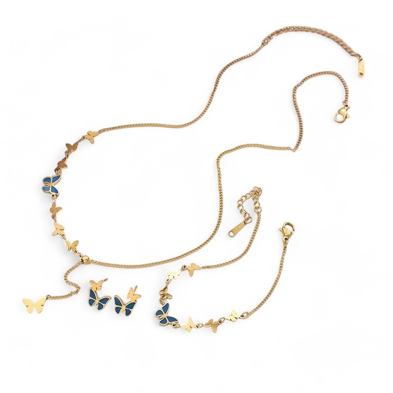 Goldenes Schmuckset mit blauen Schmetterlingen: Halskette und Armband aus Stahl mit Schmetterlinganhängern