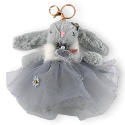 Grauer Plüschhase als Schlüsselanhänger mit Tüllrock und Blumenverzierung, niedliches Accessoire im Shabby-Chic-Stil