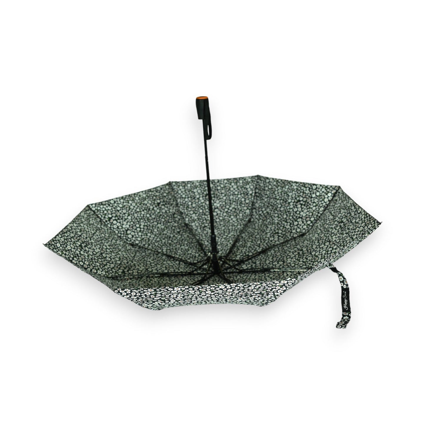 Halbautomatischer Faltregenschirm mit schwarz-weißem Blumenmuster, geöffnet liegend, elegantes Design mit gebogenem Griff