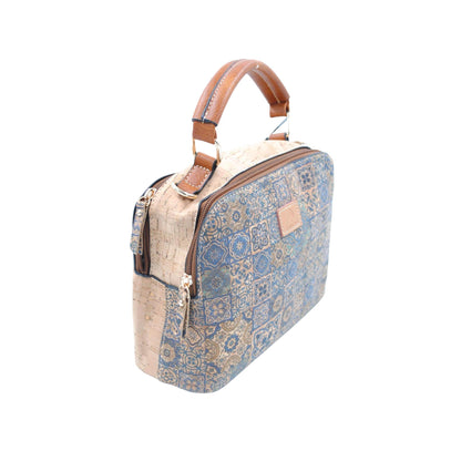 Handtasche aus Kork mit blauem Mosaikmuster, beigem Korpus und braunem Ledergriff, quadratische Form