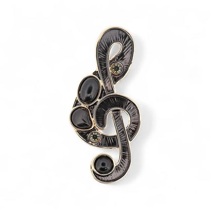 Magnetische Brosche Violinschlüssel schwarz roségold Cabochon-Steine gestreifte Textur - luxuriöser Musikschmuck
