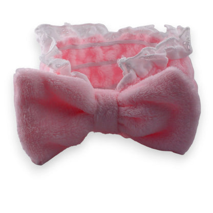 Rosa Haarreif mit großer Schleife aus weichem Plüsch und Spitzendetails, feminine Haaraccessoire für Damen