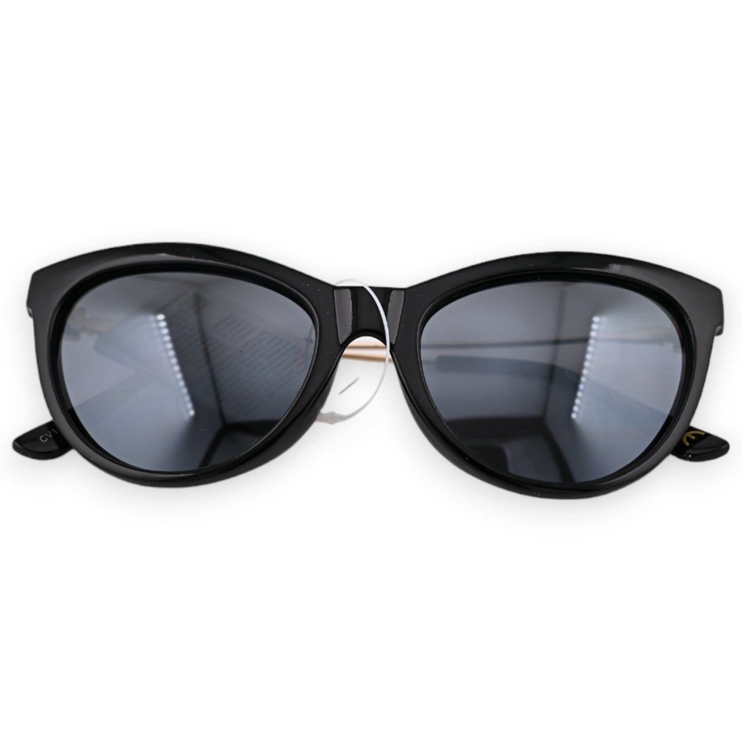 Schwarze und goldene Fliegerbrille