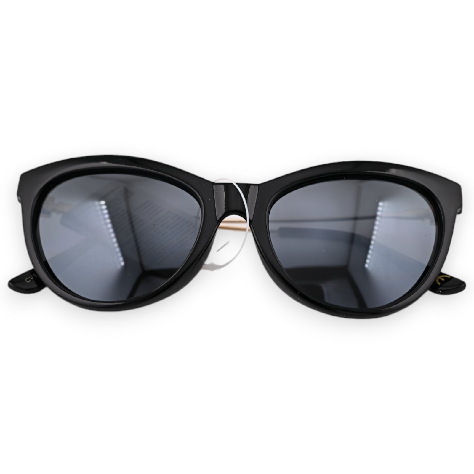 Schwarze und goldene Fliegerbrille