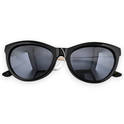 Schwarze und goldene Fliegerbrille