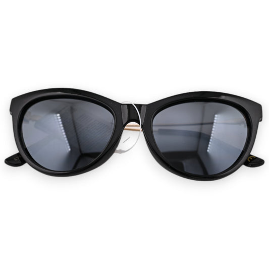 Schwarze und goldene Fliegerbrille