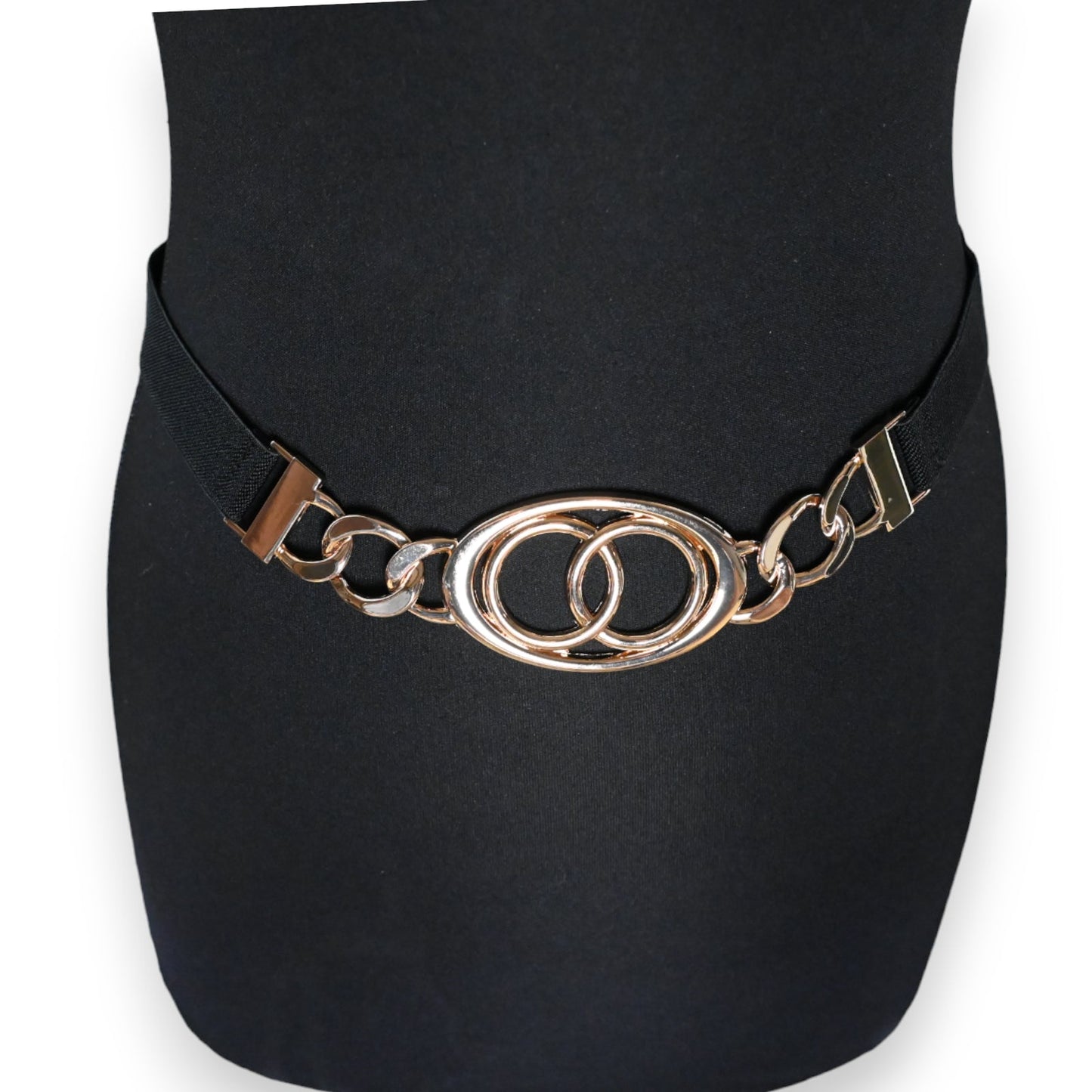 Eleganter elastischer Damen-Gürtel mit goldener Schnalle, zwei ineinander verschlungene Ringe als Verschluss auf schwarzem...