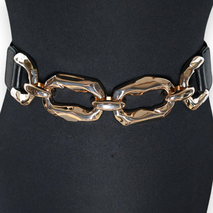 Eleganter Damengürtel mit schwarzem Elastikband und auffälliger goldfarbener Kettenapplikation als Verschluss