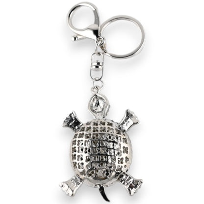 Silberner Schlüsselanhänger mit Strass-Schildkröte, detailliertes Design, glänzende Oberfläche, dekorativer Anhänger