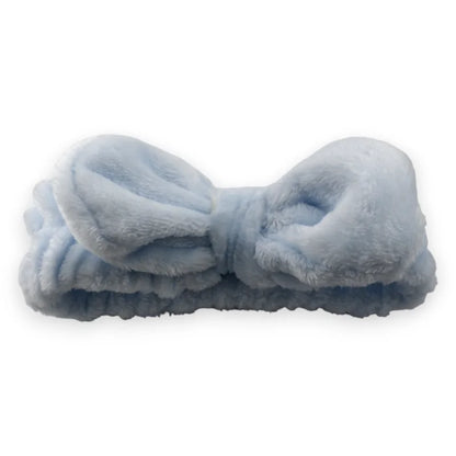 Gepolstertes Kosmetik-Stirnband in Himmelblau, weiches Beauty-Accessoire mit dekorativer Schleife