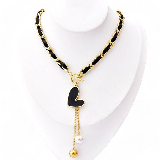 Asymmetrische Herz-Halskette in Gold und Schwarz
