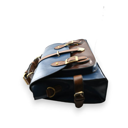 Vintage Lederaktentasche in Blau und Braun mit goldenen Schnallen, seitlicher Ansicht zeigt elegantes Design und Qualität