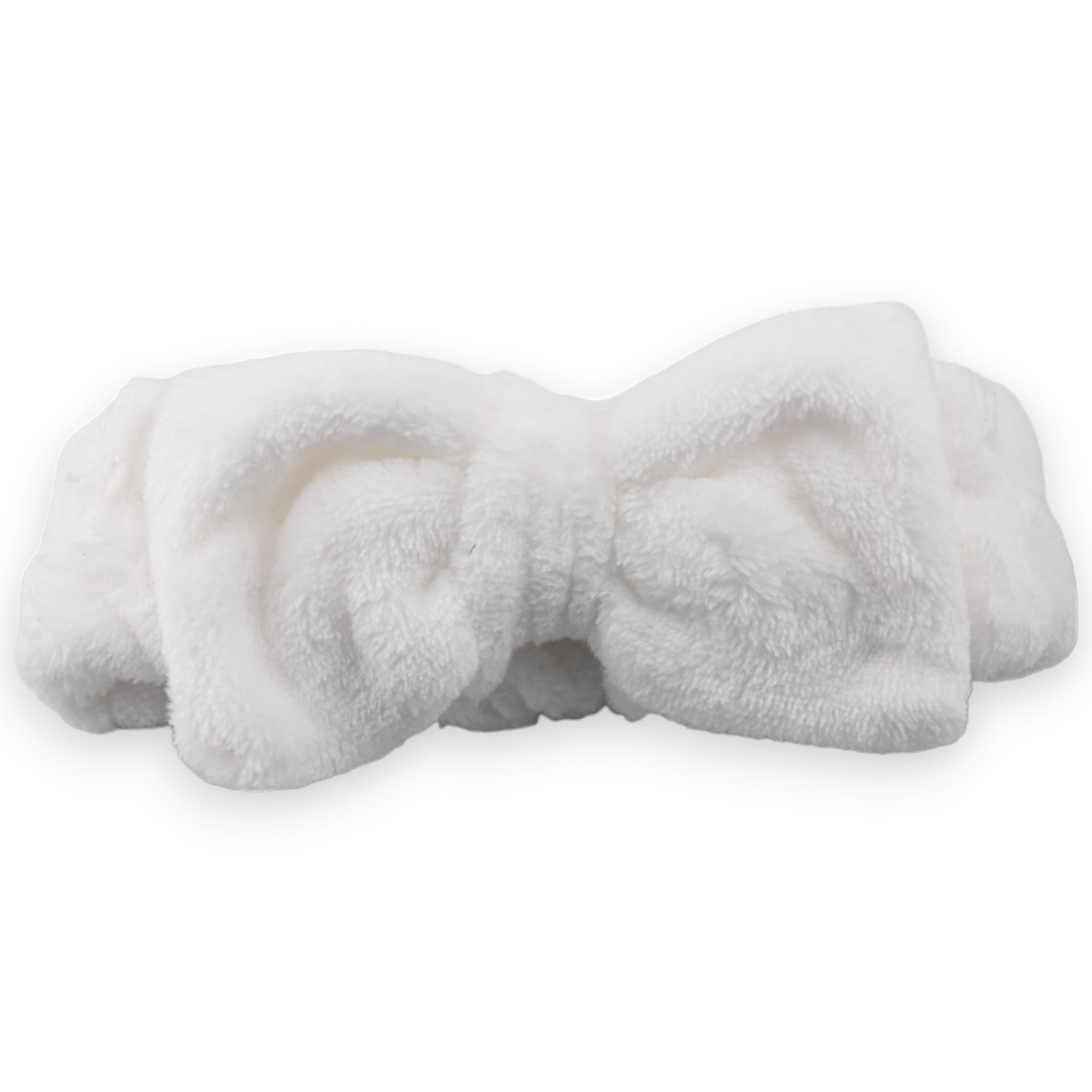 Weiches, flauschiges Make-up-Stirnband in Weiß, gefaltet und kuschelig, für Gesichtsreinigung und Kosmetikanwendungen